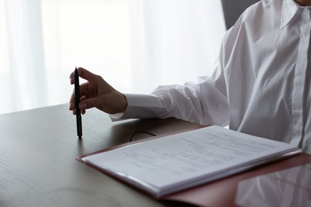 image of a doc with a pen and notebook
